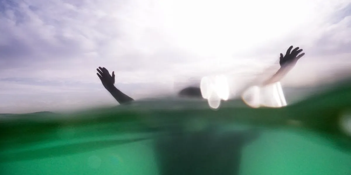 drowning person in the sea