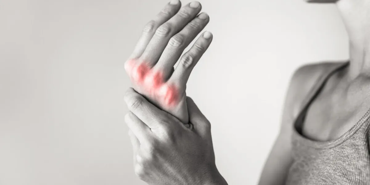 woman suffering from pain in hands and fingers, arthritis inflam