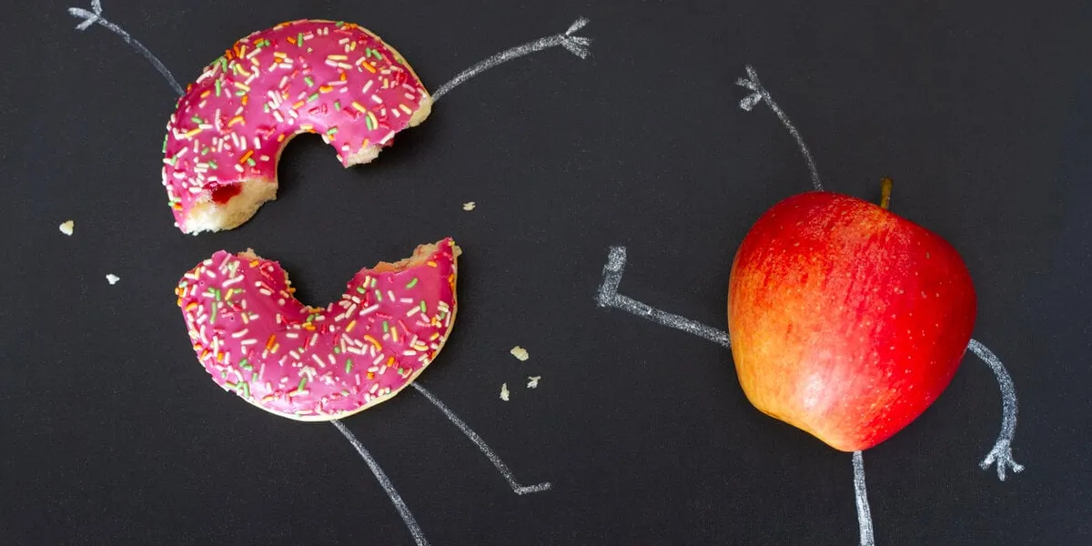choice between apple and donut, creative, funny healthy diet concept idea