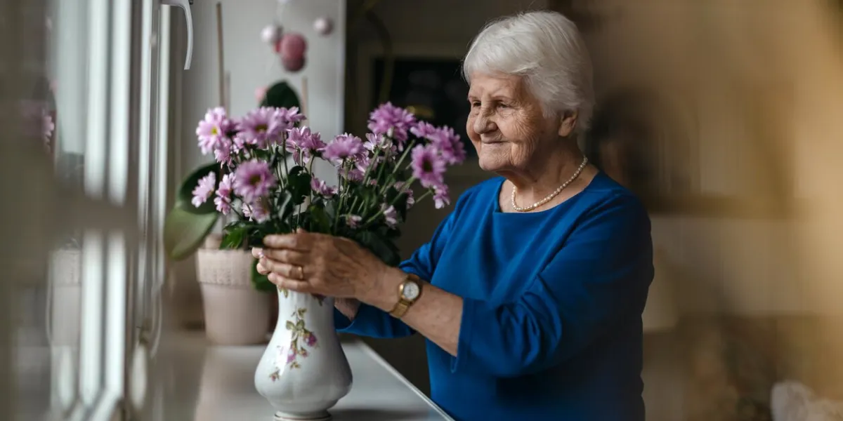 portrait of an elderly woman in her home