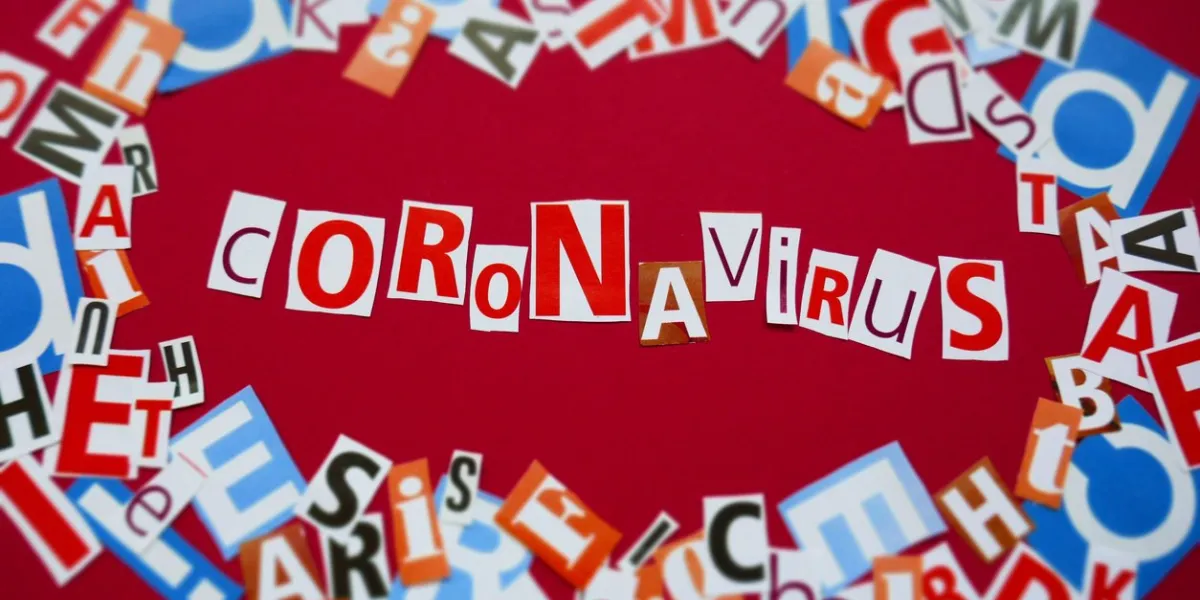 coronavirus infection epidemic conceptcoronavirus news coronavirus statisticsword coronavirus from newspaper letters on a red background medicine and healthinformational news concept