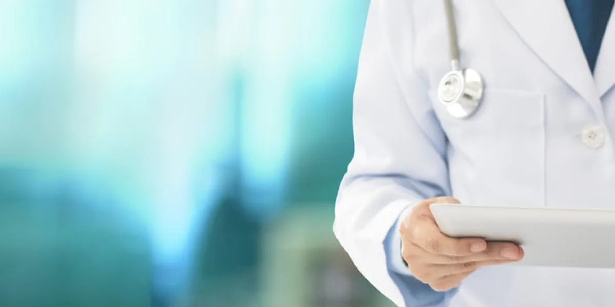 healthcare and medicine technology concept doctor or medical students using digital tablet at hospital ward