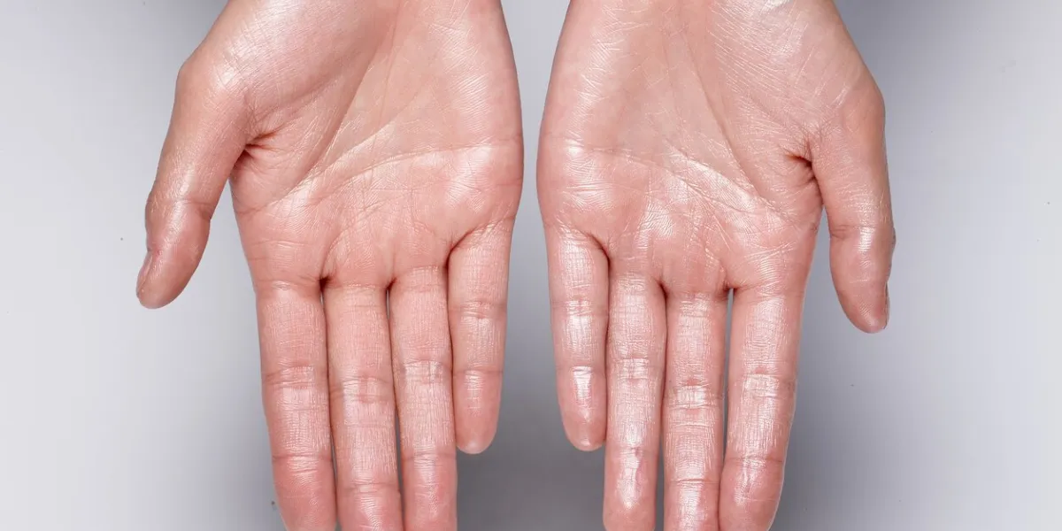 glossy hand wet hands