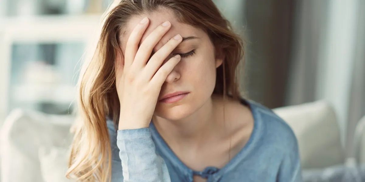 young woman with headache