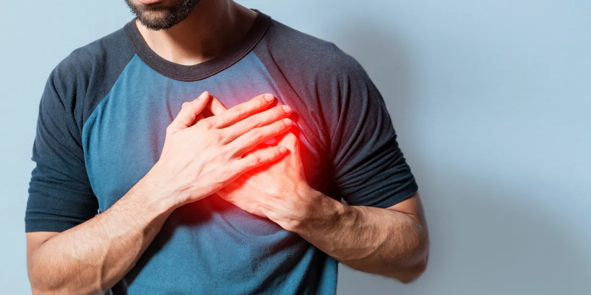 people with chest pain isolated, young man with tachycardia, man with heart pain on isolated background, young man with heart pain concept of people with heart problems