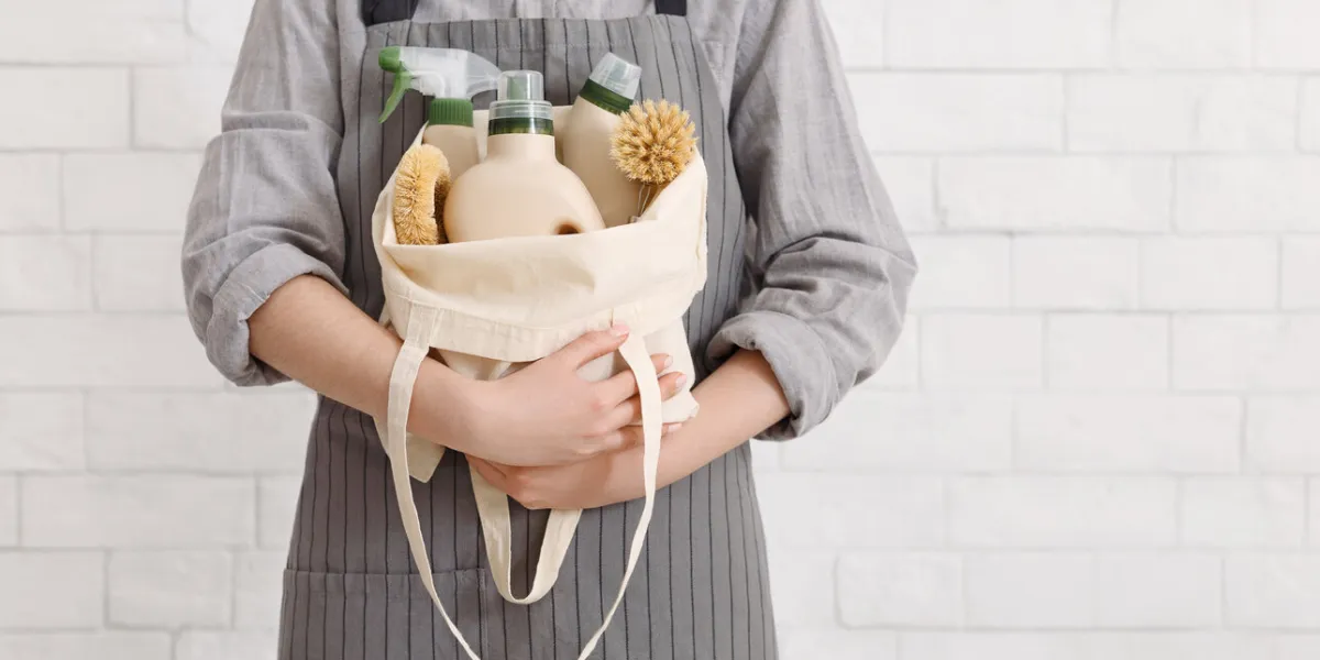 unrecognizable woman holding eco friendly products for home cleaning natural domestic cleaning, zero waste detergent