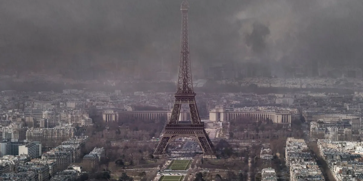 aerial view of eiffel tower on stormy rainy day in autumn