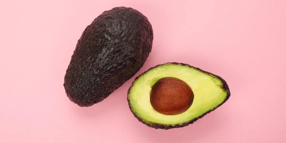 top view of a ripe sliced avocado isolated