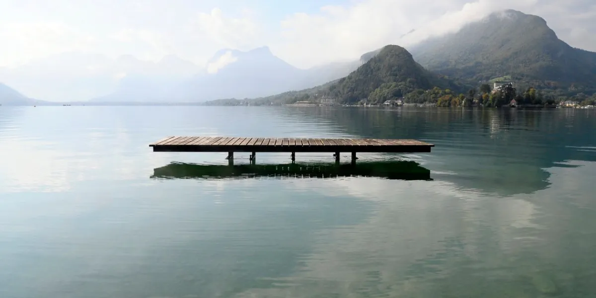 landscape of annecy lake and mountains in savoy, france