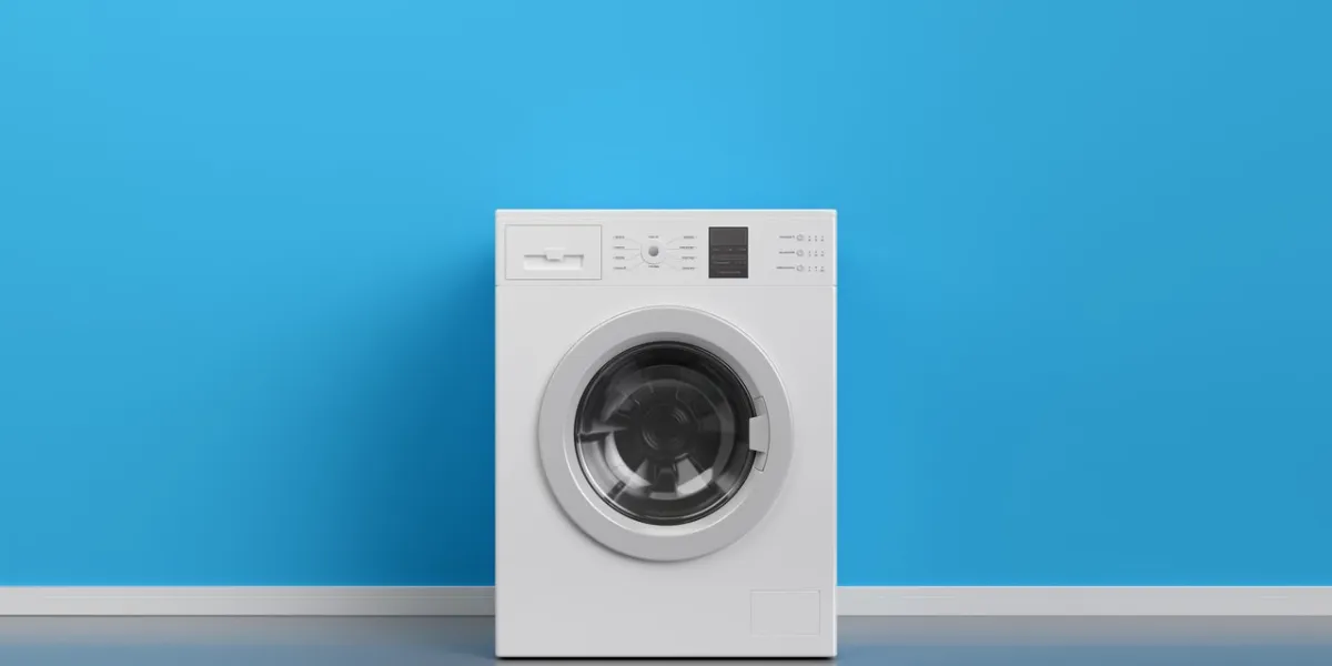 washing machine at blue wall, frontal view with copy space,3d rendering (general design and captions)