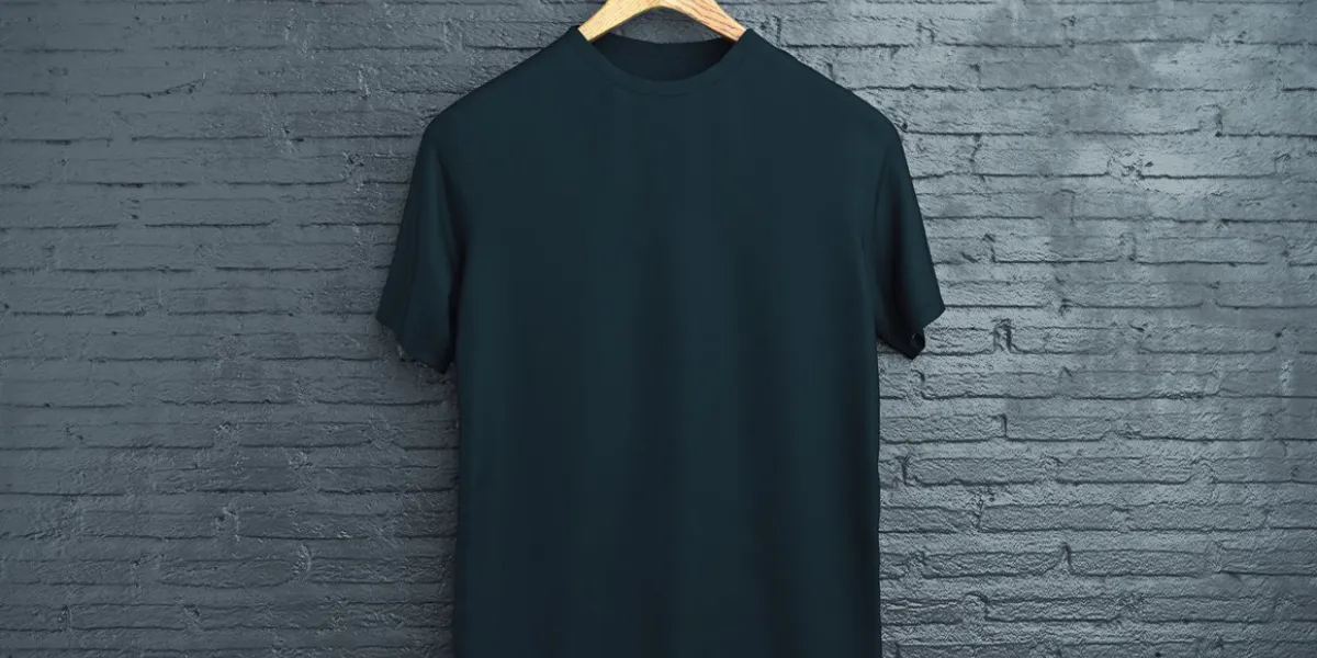 wooden hanger with empty black t-shirt hanging on dark brick background retail concept mock up 3d rendering
