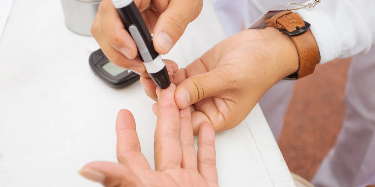diabetes checking blood sugar levels senior citizen in health campaign