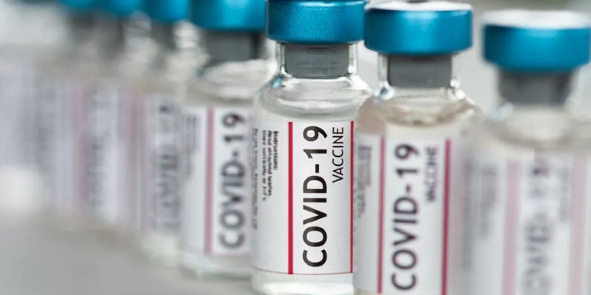 covid-19 coronavirus vaccine vials in a row macro close up
