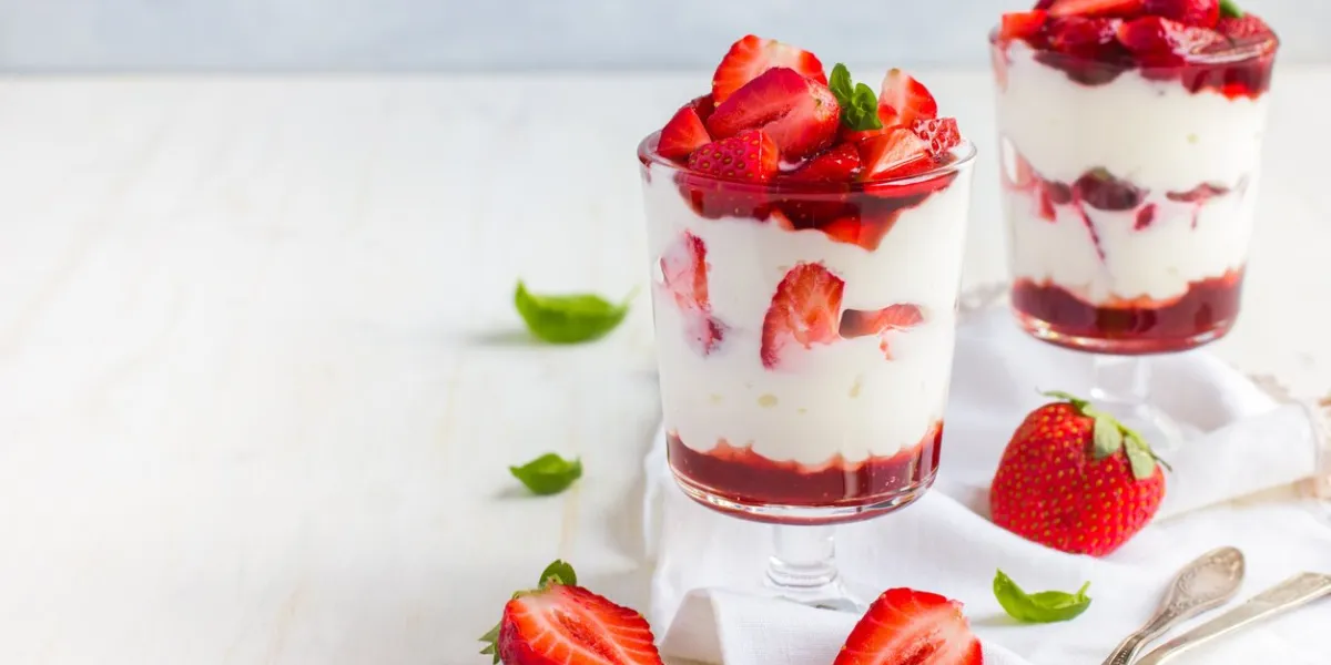 dessert with fresh strawberry, cream cheese and strawberry jam on glasses