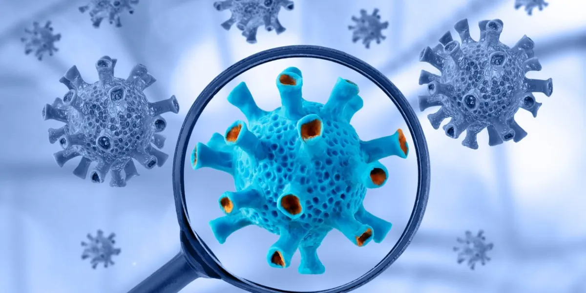 covid virus cell view through a magnifying glass coronavirus concept