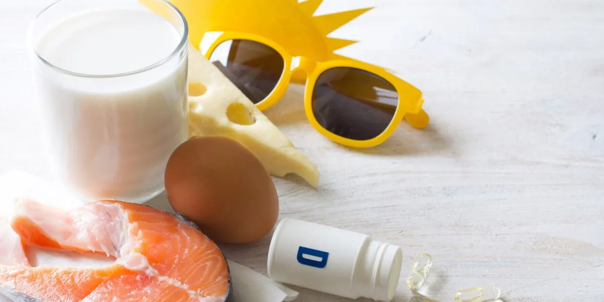 food products, sun and vitamin d in capsules, various sources of vitamin d concept background