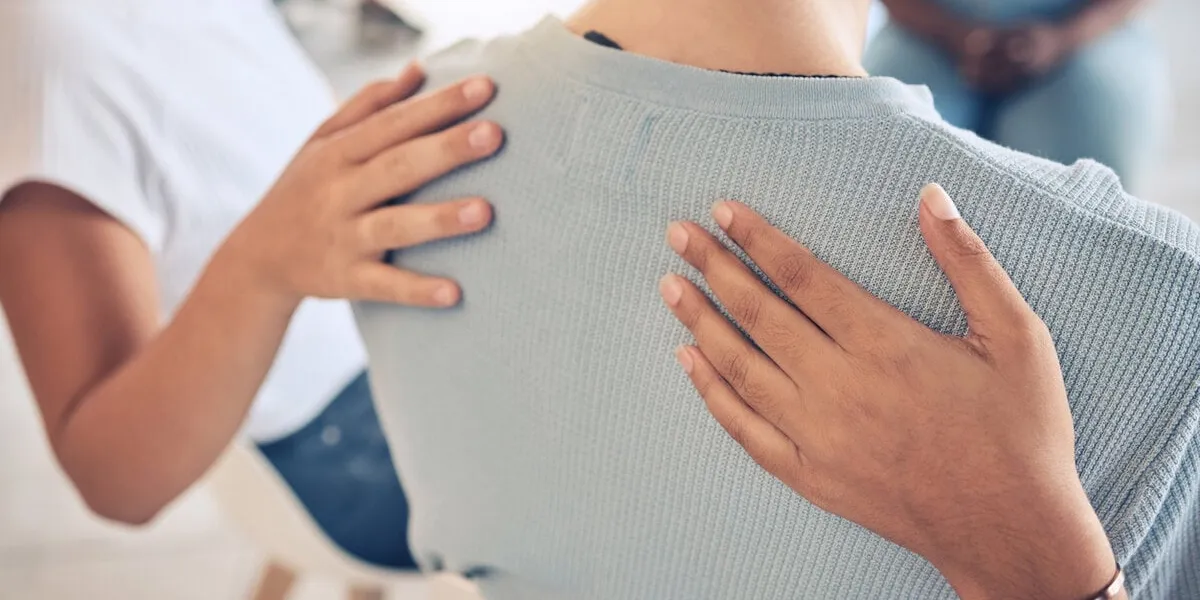 hands, mental health and support in group therapy for woman suffering depression, stress and trauma closeup hand, people and aa meeting by community in trust, help and empathy for girl with anxiety