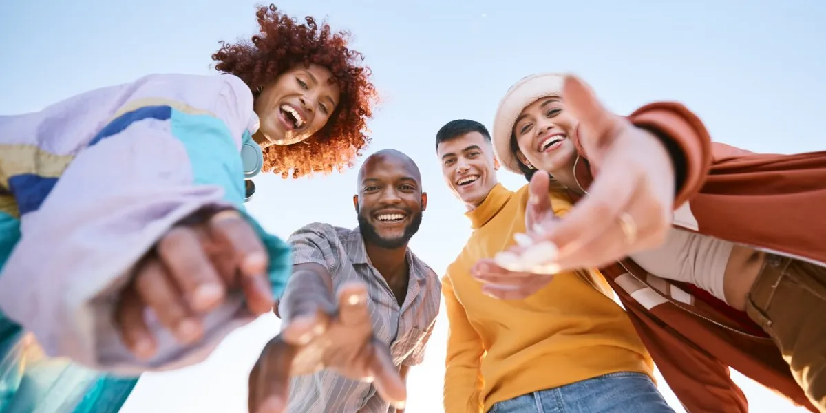 friends, selfie and hands outdoor for social media, fashion and fun adventure below diversity, youth and portrait of student group or men and woman for profile picture, memory and freedom in nature