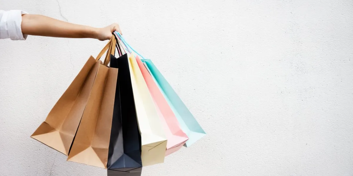 shopping bags of women crazy shopaholic person at shopping mallcolorful paper shopping bags
