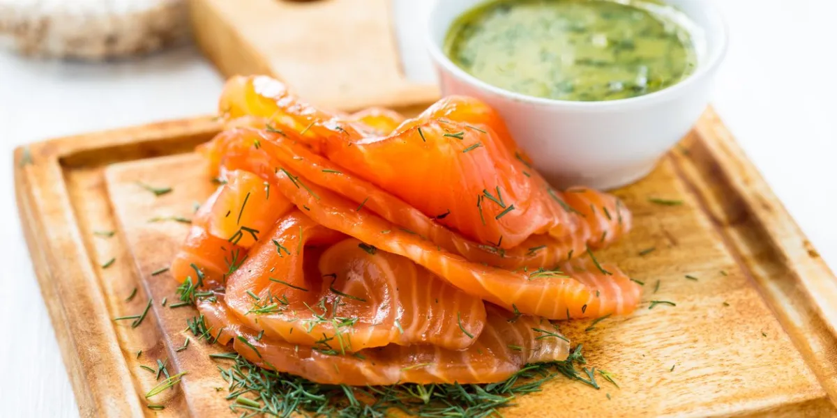 gravadlax, scandinavian-style smoked salmon with dill, and serve with a mustard sauce
